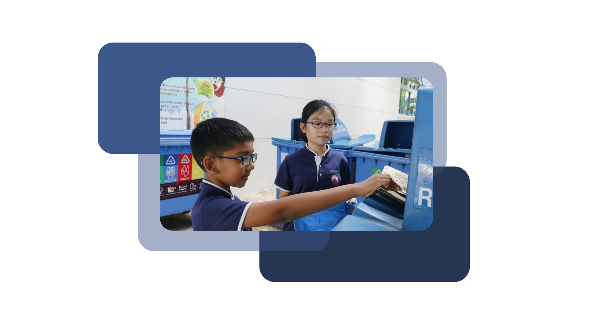 Two students, a boy and a girl throwing a cardboard in a recycling bin